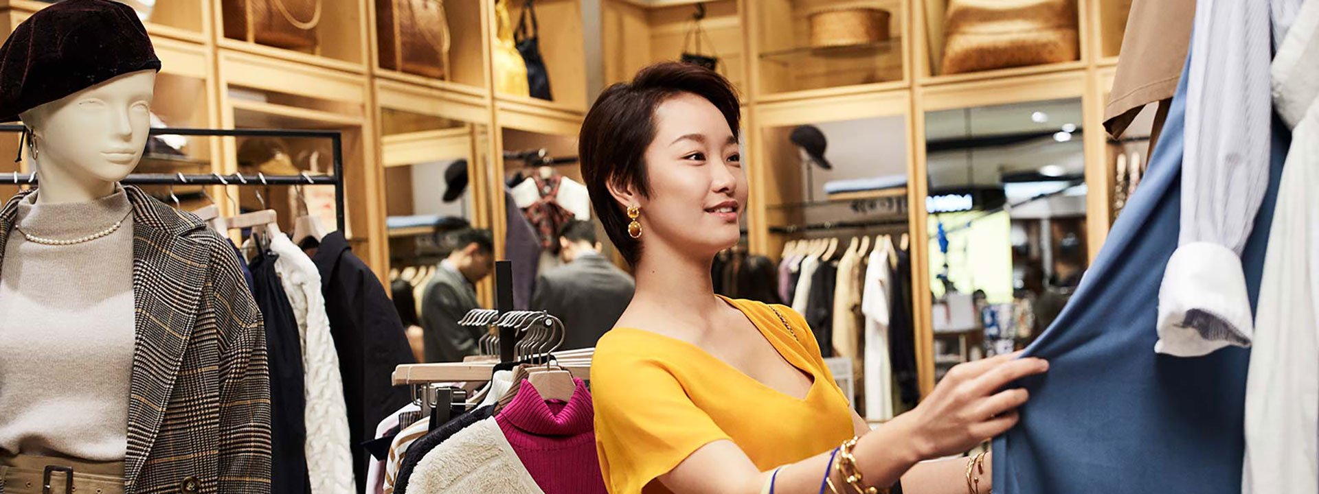 Women browsing for clothes in a retail store