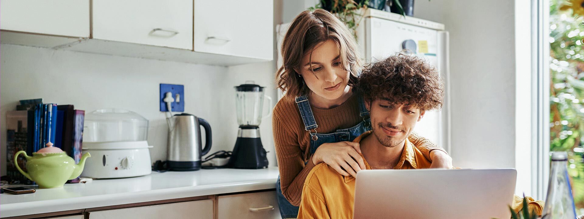 couple using laptop